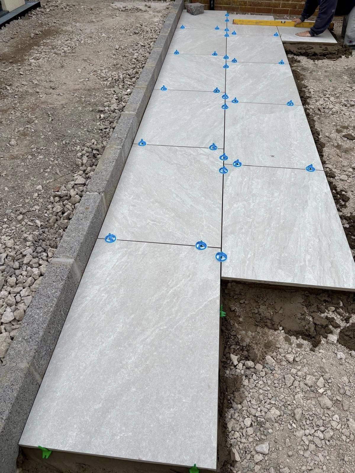 Brabazon team laying paving on-site in Bristol